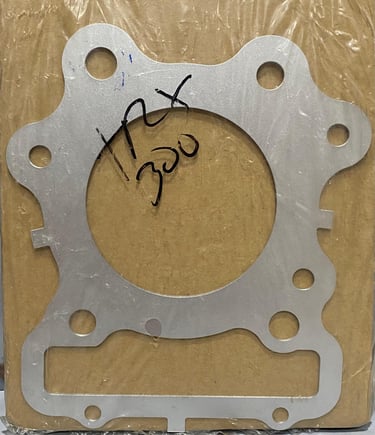 EMPAQUE CABEZOTE TRX300 ORIGINAL