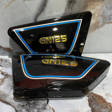 TAPAS LATERALES GN125