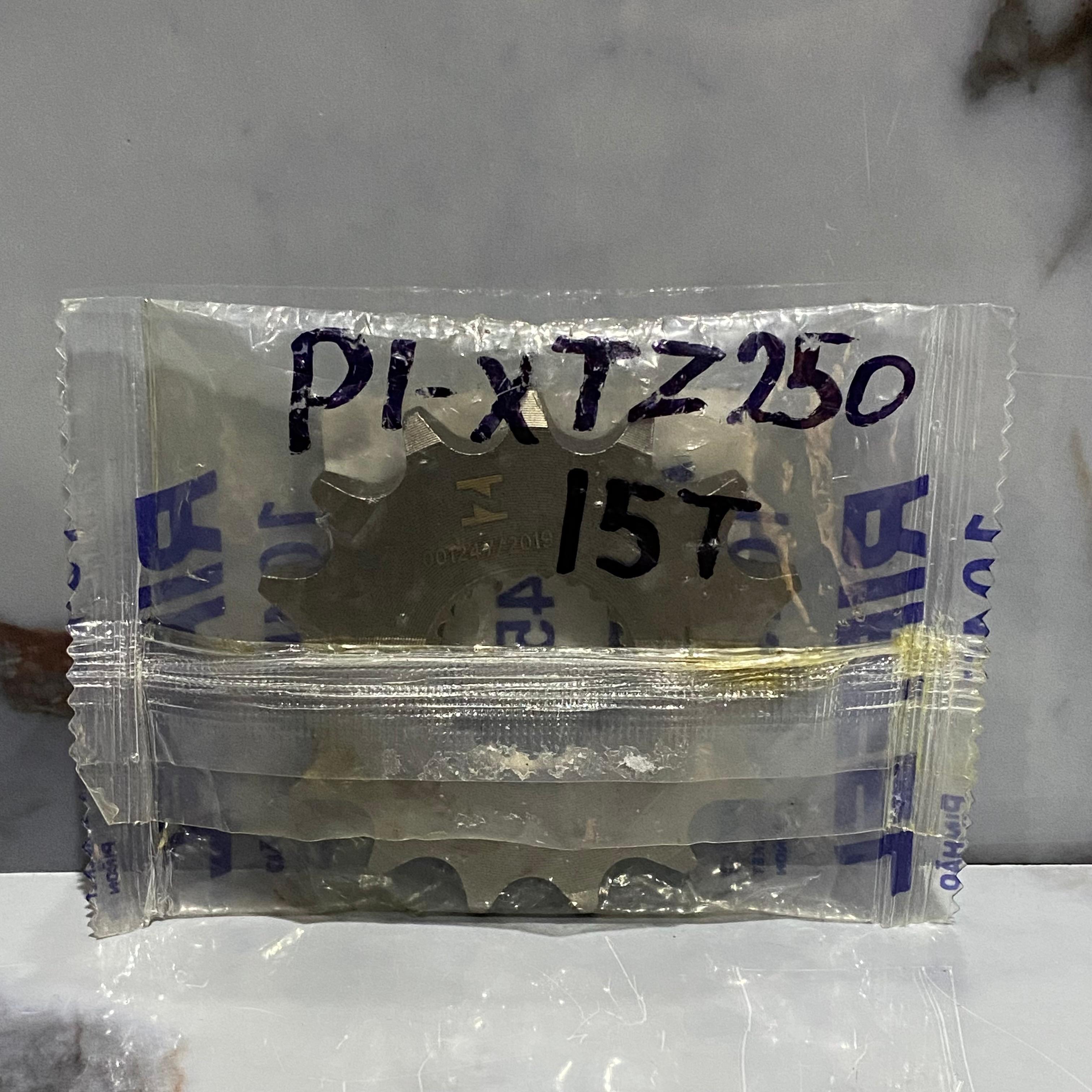 PIÑON XTZ250 DELANTERO 15T