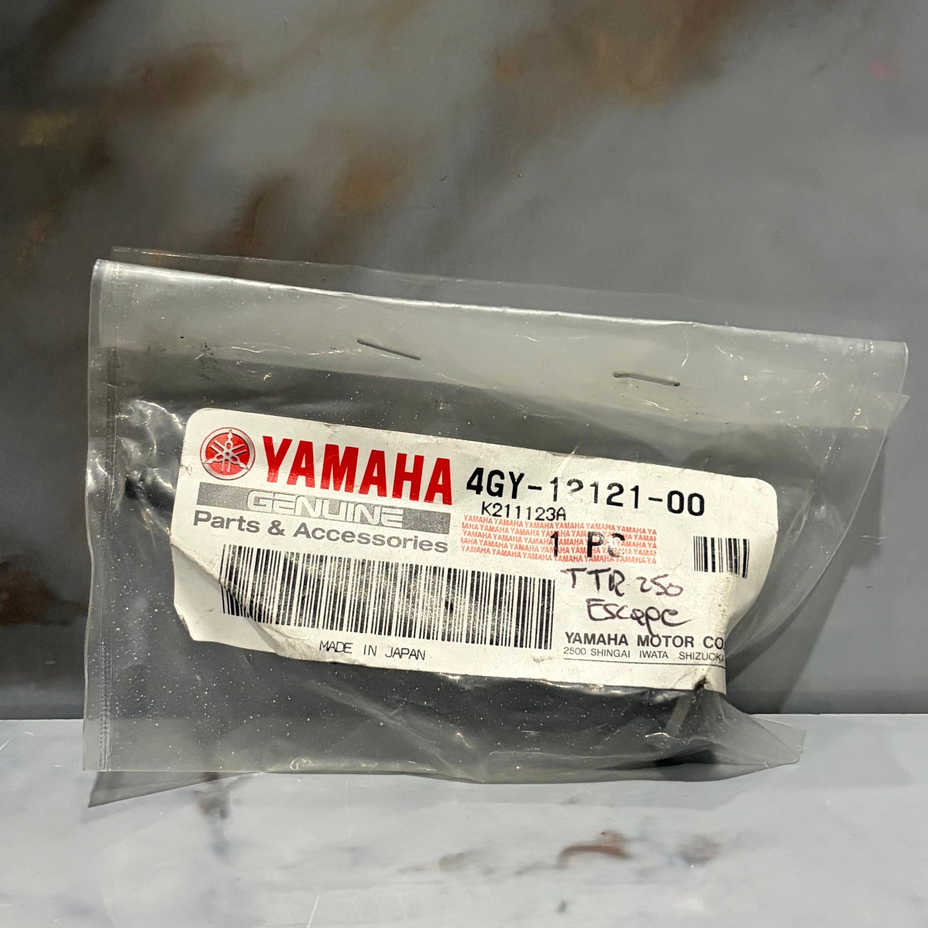 VALVULA ESCAPE TTR250 ORIGINAL