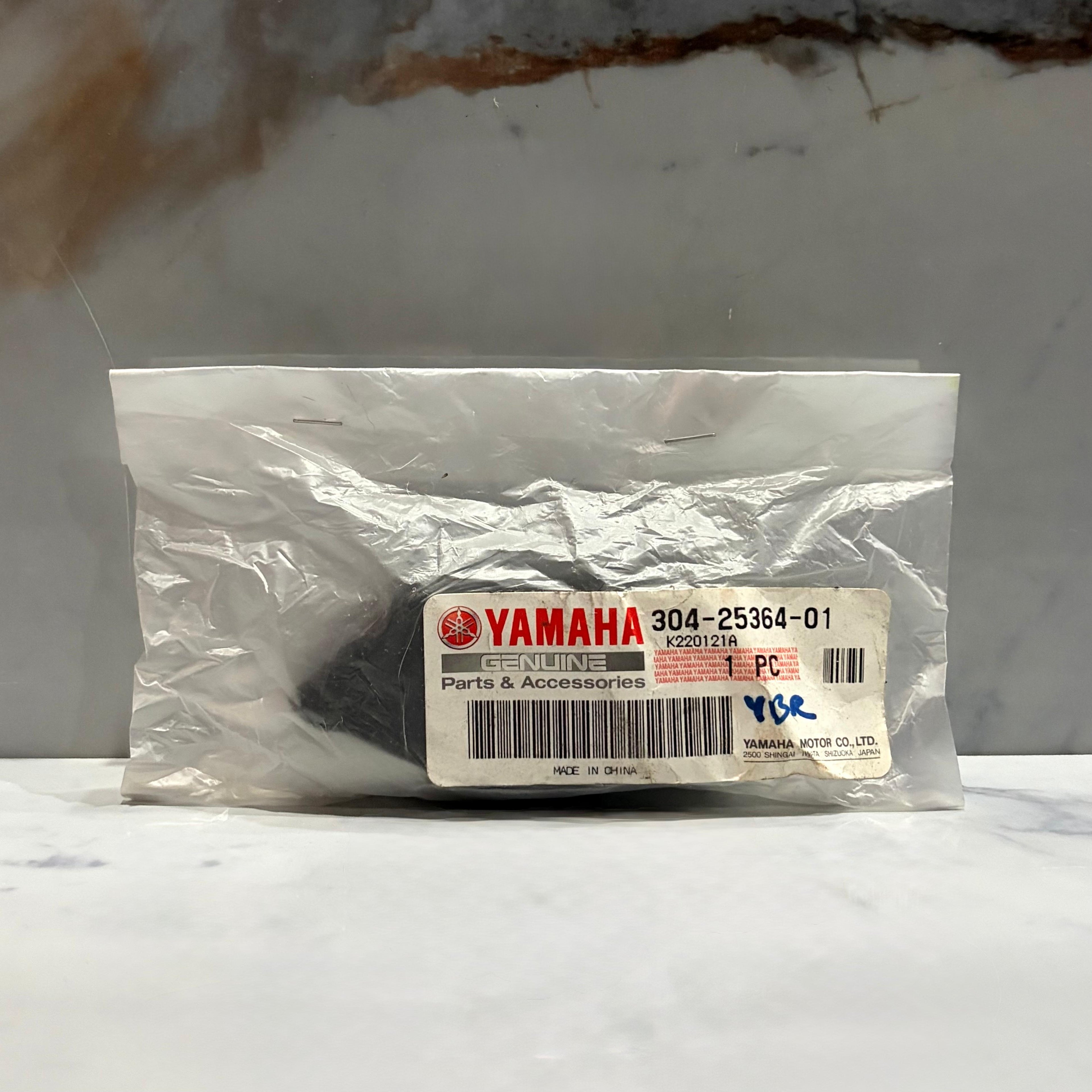 HULE PORTA PIÑON YBR125 ORIGINAL